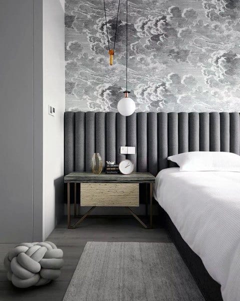 gray padded headboard pendant light cloud wallpaper