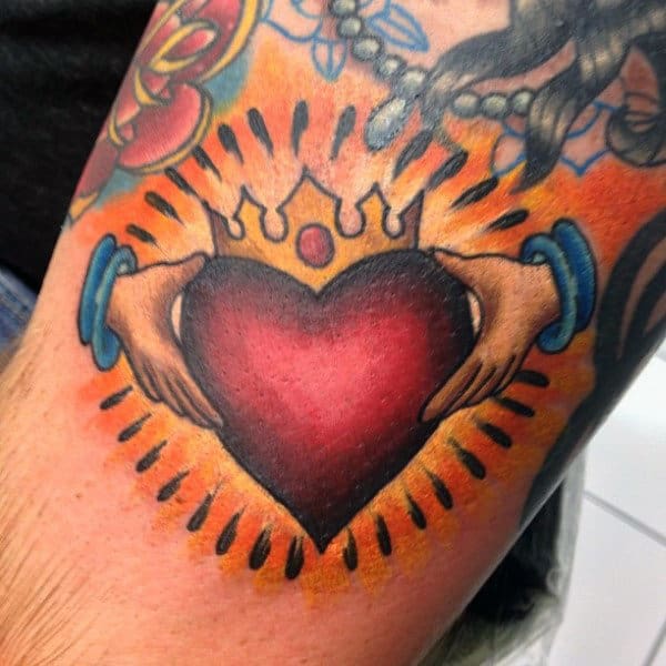 Radiant Irish Claddagh Tattoo Designs On Arm