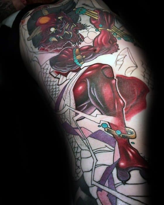 Striking Raijin leg tattoo with dark red thunder god, turquoise accents, and dynamic motion across swirling clouds and bold outlines.