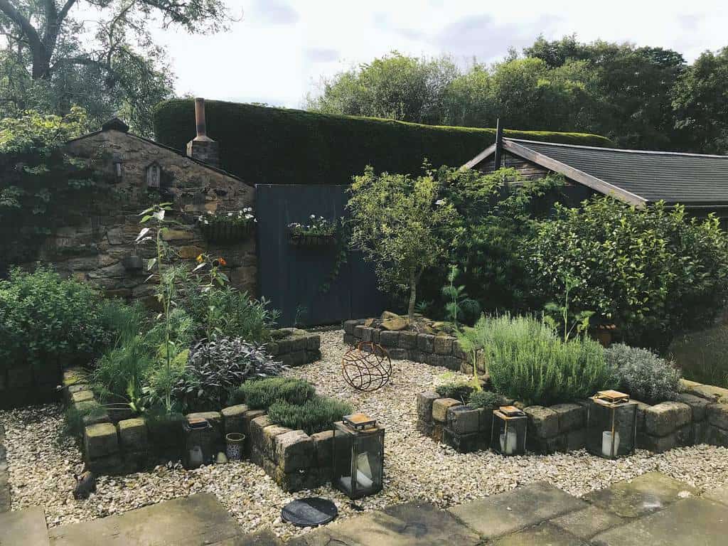 stone retaining wall herb garden