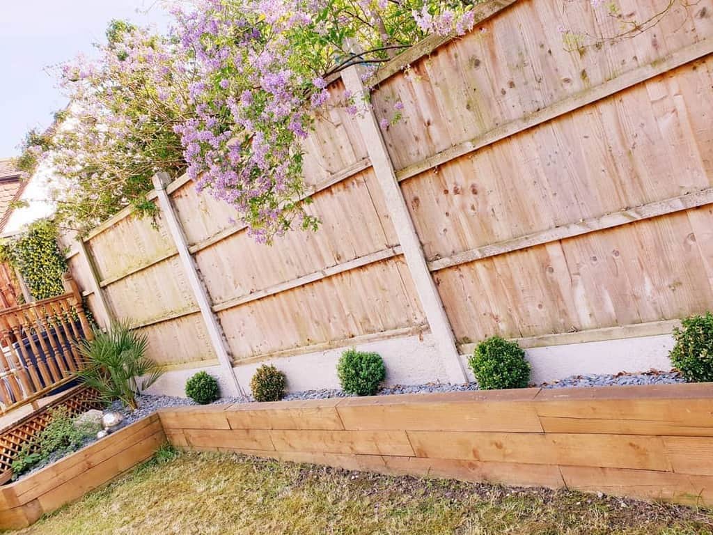 raised garden wood edging retaining wall high wood fence