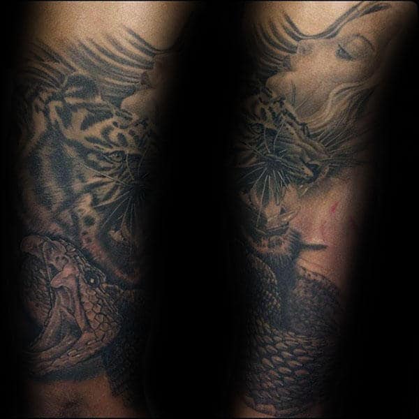 Rattlesnake Tattoo On Mans Forearms