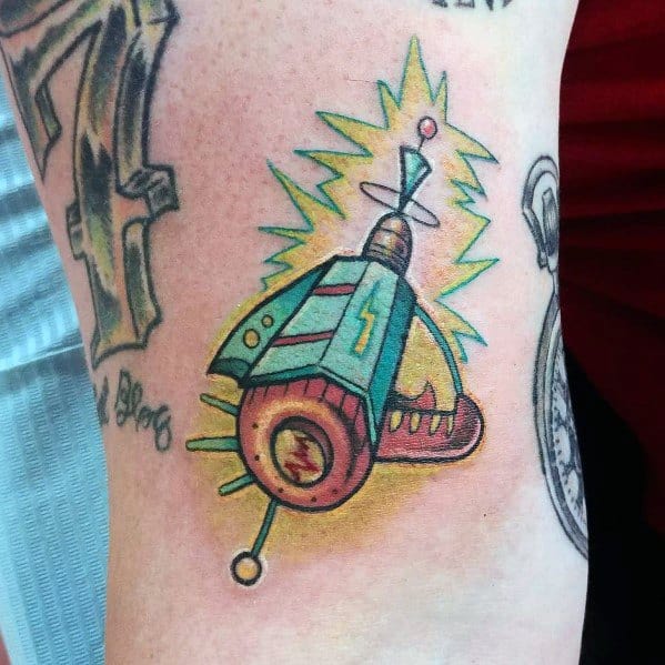 Vibrant retro ray gun tattoo with bold colors, lightning accents, and a classic sci-fi aesthetic, featuring dynamic energy bursts for a futuristic look.