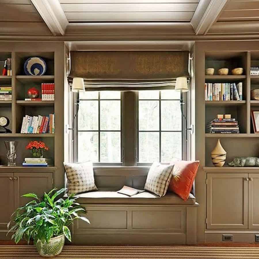 reading nook gray cushions book shelves pot plant