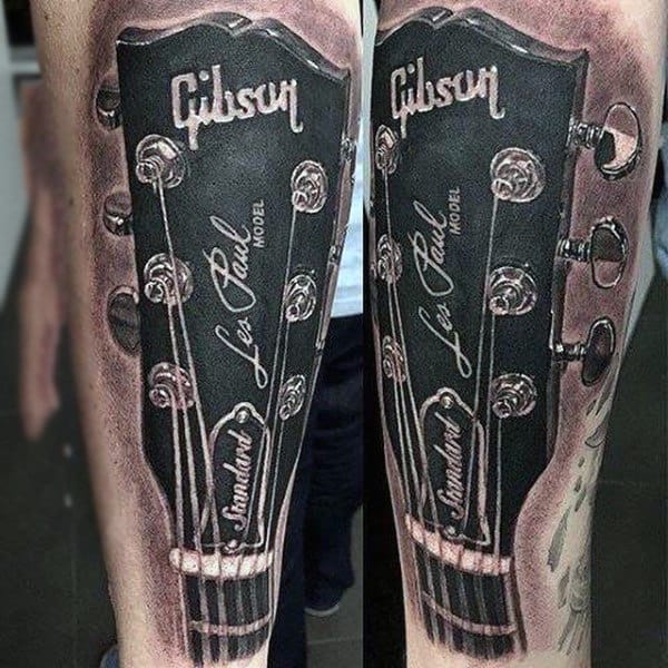 Realism Tattoo Of Musical Instrument Mens Lower Legs