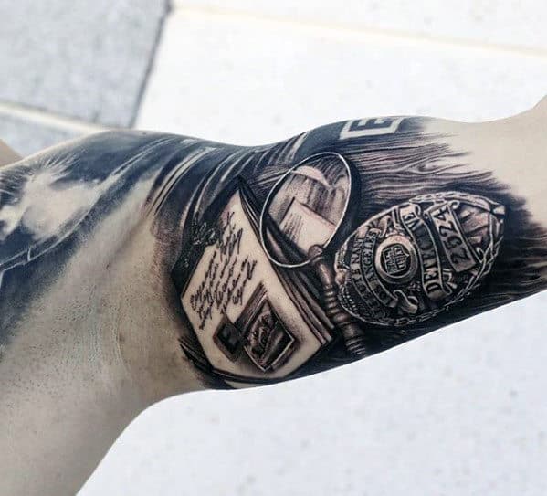 Realistic 3d Police Detective Badge With Papers And Magnifying Glass Mens Quarter Sleeve Tattoo