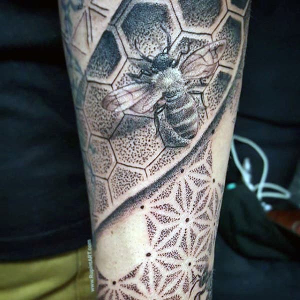 Realistic Bee On Dotted Grey Honeycomb Tattoo