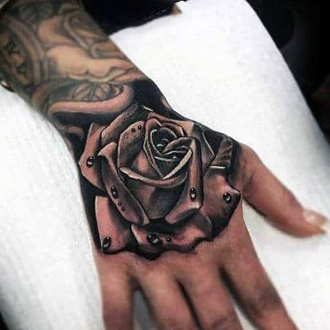 Realistic Grey Rose And Dewdrops Tattoo Guys Hand