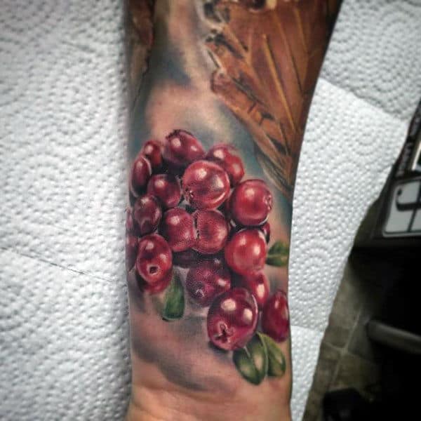 Realistic Male Forearms Glossy Grapes Tattoo