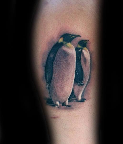 Realistic Male Penguins Tattoo Design On Leg