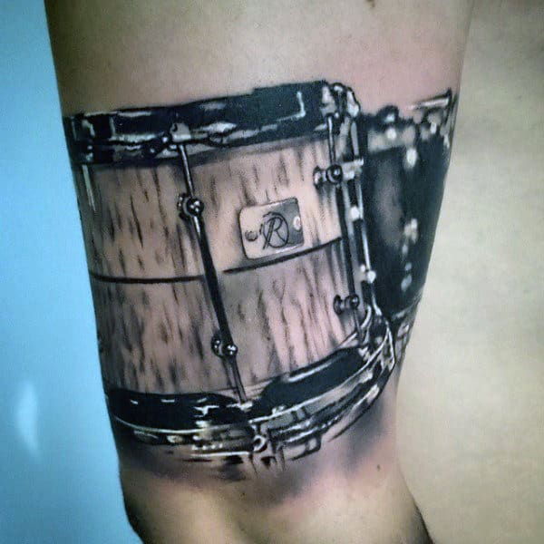 Realistic Male Tattoos Of Drums On Arm