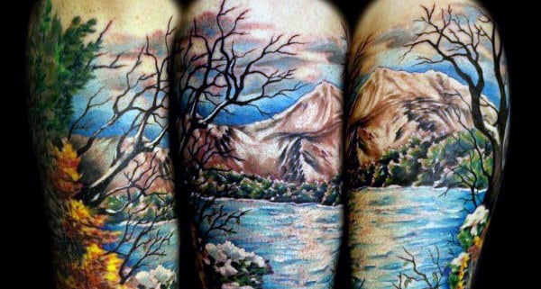 Realistic Men's Arm Tattoo With Mountain On Arms