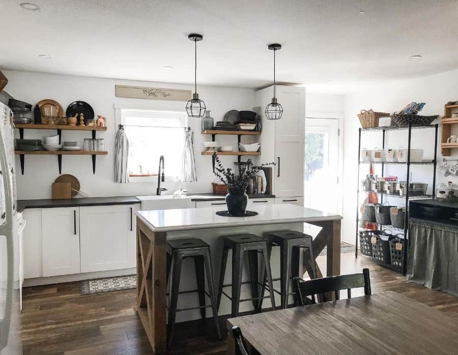 farmhouse kitchen with white cabinets and island