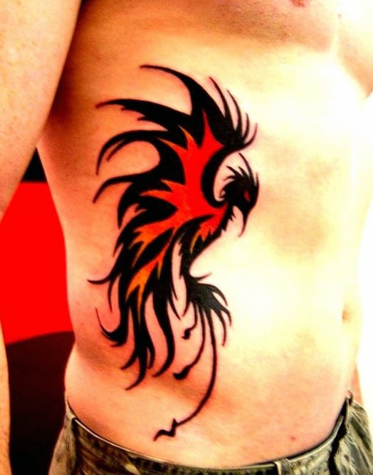 Red And Black Ink Phoneix Tribal Bird Mens Rib Cage Side Tattoo