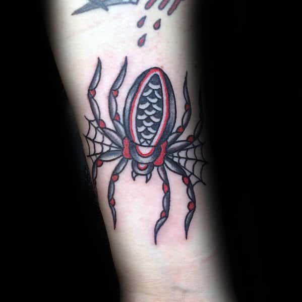 Red And Black Ink Traditional Spider Tattoo On Mans Forearm