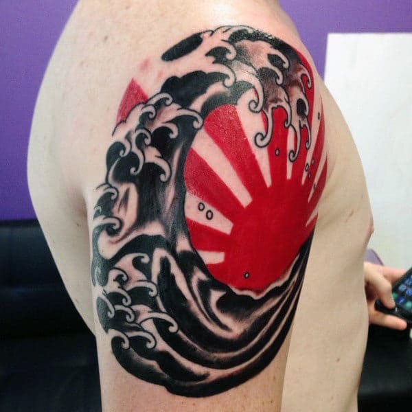 Red And Black Japanese Sun Tattoo For Guys On Upper Arm