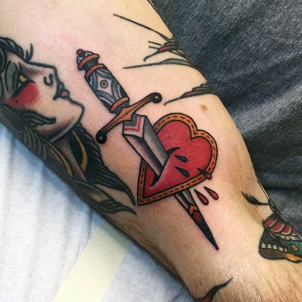 Red Heart And Dagger Tattoo Male Forearms