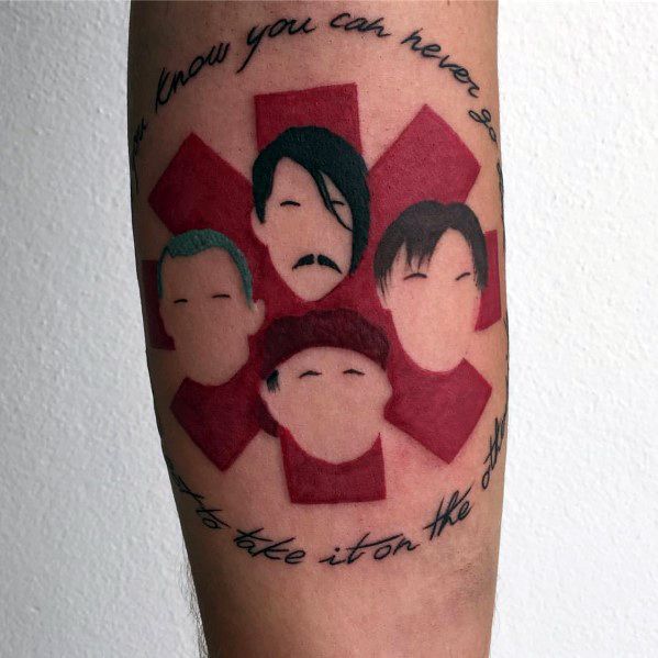 Forearm tattoo featuring the Red Hot Chili Peppers logo with faceless portraits of the band members and song lyrics curved around the design.