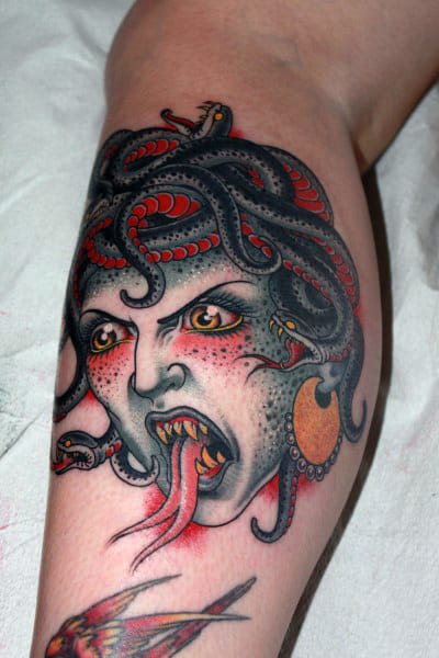 Red Ink Bicep Mens Medusa Tattoo