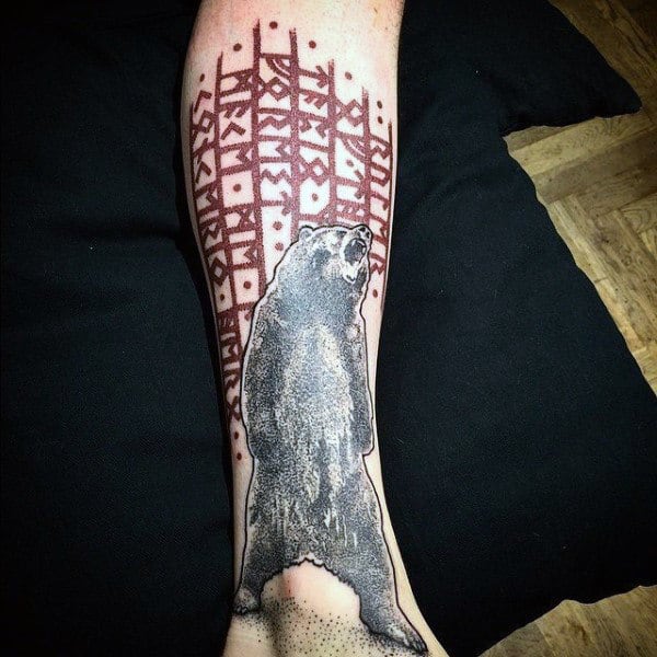 Red Ink Rune Tattoo On Mans Leg With Dotwork Bear Design