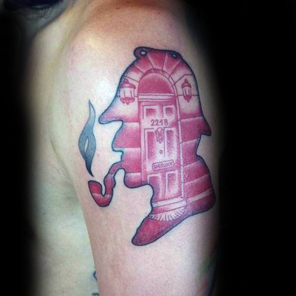 Tattoo of Sherlock Holmes' silhouette with a pipe overlaying a door labeled "221B" on an arm