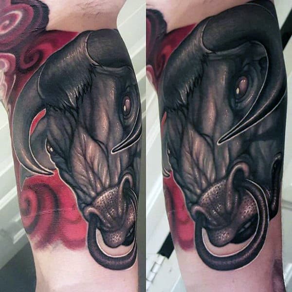 Red Matador Bull Tattoo On Man's Forearm
