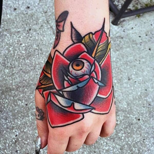 red-rose-with-eye-ball-traditional-american-tattoo-guys-hands