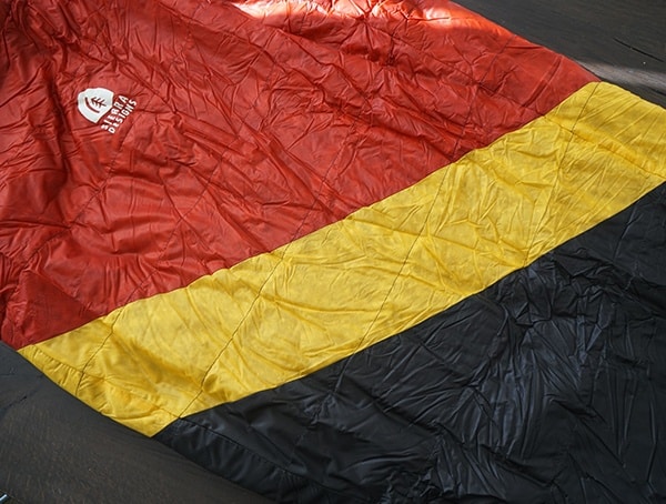 Red Yellow And Black Sierra Designs Nitro 800 20 Degree Sleeping Bag For Men