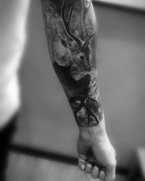 Tattoo of a majestic deer with its reflection in water, creating a surreal and symbolic design with intricate shading and depth.