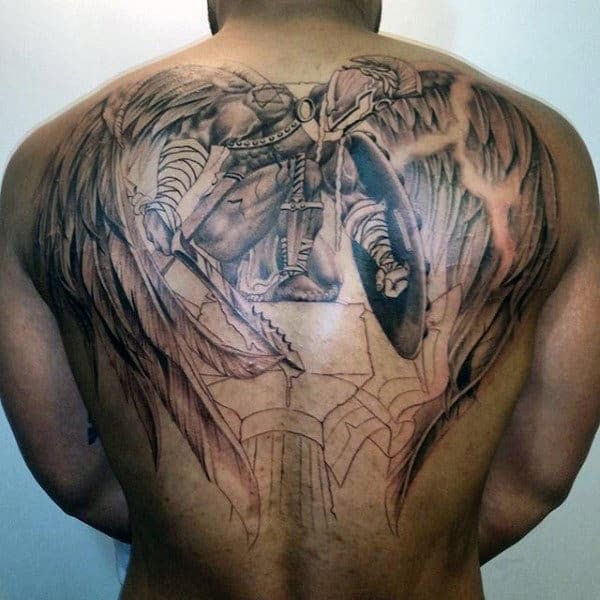 Back tattoo of an armored warrior angel with wings and a sword