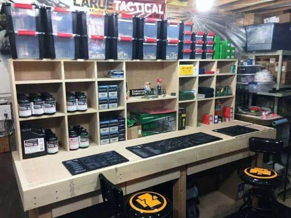 Large reloading bench with ample shelving, labeled bins for storage, and a spacious work surface for reloading tasks
