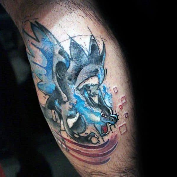 Abstract-style Mega Charizard X tattoo with bold black strokes, electric blue flames, and dynamic pixel accents on the lower leg.
