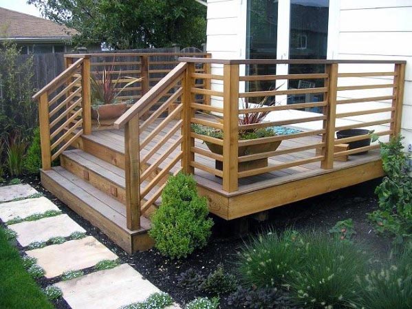 small wood deck and railing patio