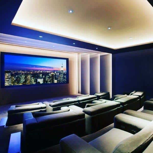 layered ceiling lights in large luxury home theater 