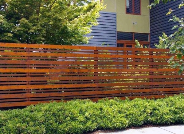 wooden fence with varied panel sizes
