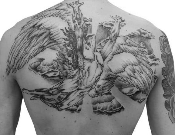 Large black and gray back tattoo of the winged Icarus figure from Led Zeppelin’s Swan Song logo, surrounded by stylized clouds.