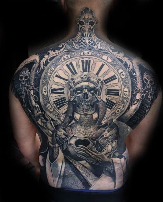 Intricate back tattoo of a skeletal figure with a clock halo, dark wings, and symbolic hands, representing death, time, and transformation.