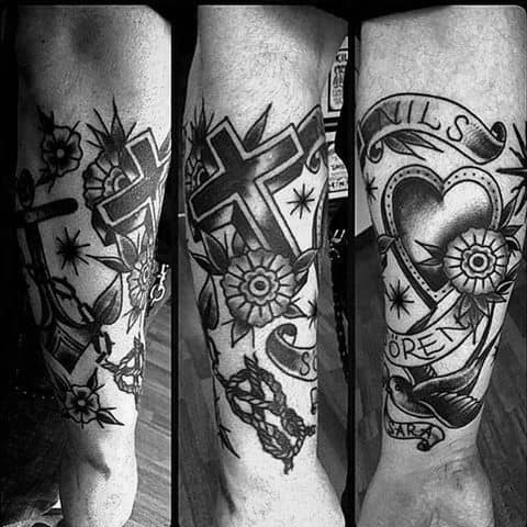 Leg tatttoo with cross with flowers, thorny heart, and "Nils" in a banner on each