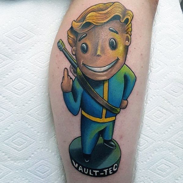 Vault Boy bobblehead-style tattoo standing on a Vault-Tec base, smiling with a slung weapon and bright, cartoon-like shading.