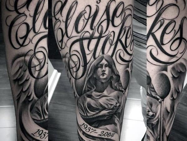 Tattoo of Eloise Stokes with angel, wings, and dates 1937-2004 on a person's arm