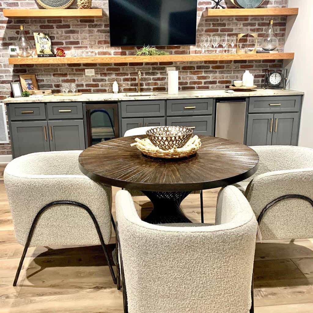 brick wall backsplash with gray cabinets