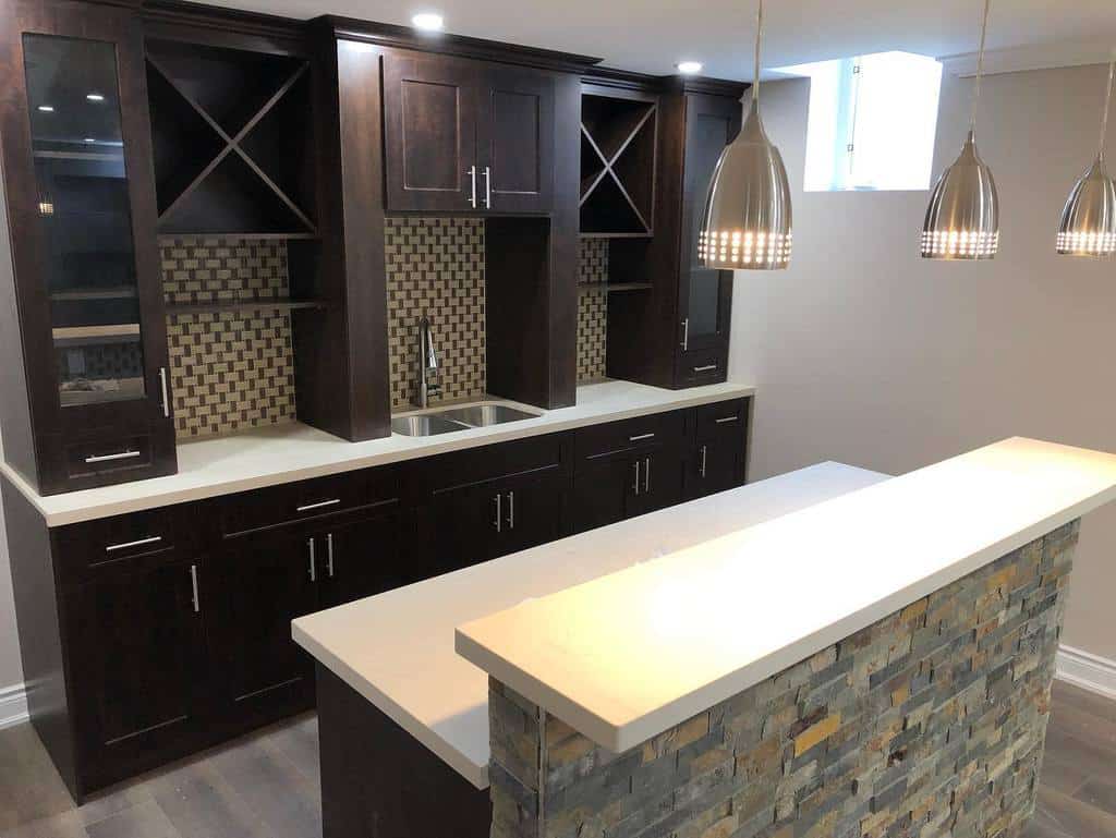 remodelled basement kitchen with pendant lighting