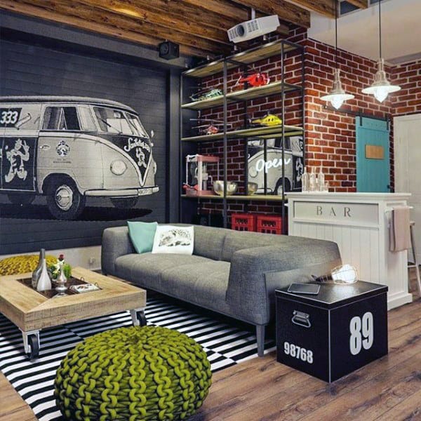 masculine man cave gray sofa white bar volkswagen wall art