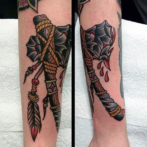 Retro Tomahawk Tattoo Style On Mans Inner Forearm