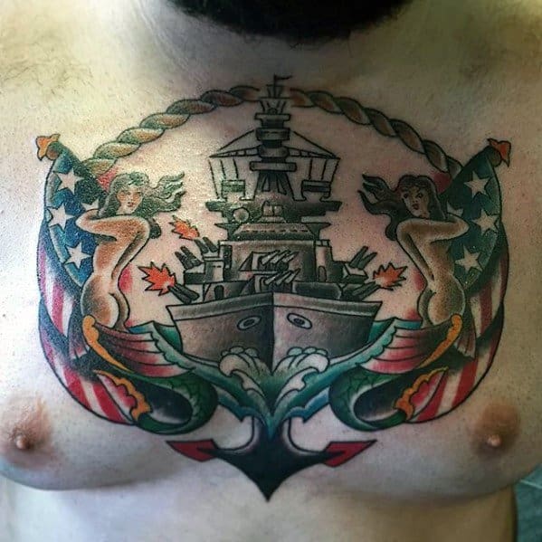Nautical chest tattoo featuring a battleship, mermaids, and anchors