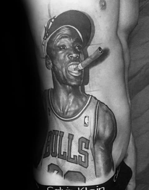 Realistic black and grey tattoo of a basketball player in a Bulls jersey smoking a cigar, capturing a victorious post-game moment.
