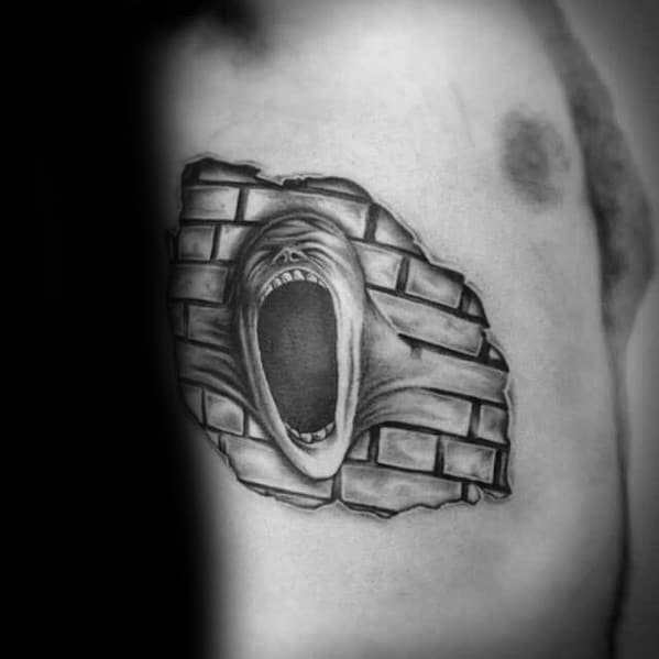 Rib Cage Side Brick In The Wall Pink Floyd Tattoo Design On Man
