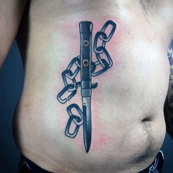 Rib Cage Side Chains With Switchblade Tattoo Ideas On Guys