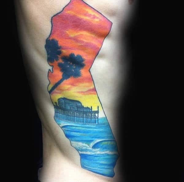 Rib Cage Side Guys California State With Colorful Sunset Ocean Waves Tattoo