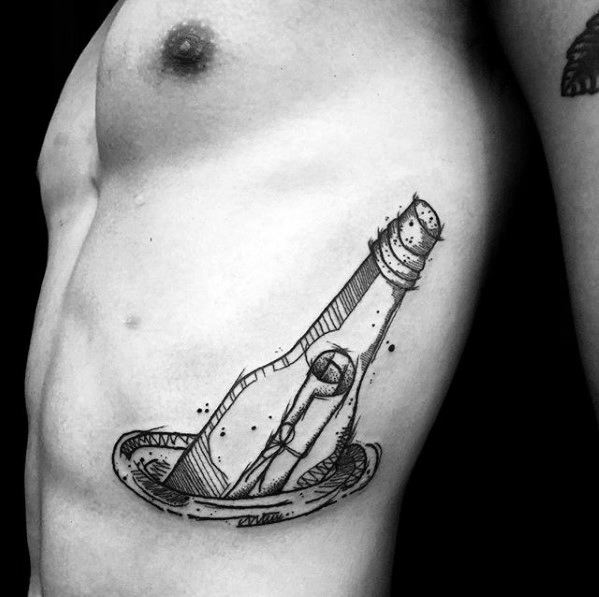 Minimalist black ink tattoo of a message in a bottle, featuring fine lines and geometric details on the ribcage